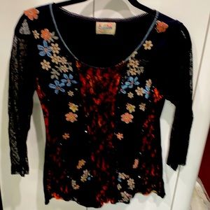 Womens top. Size large. Black & neutral colors